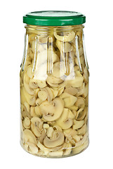 Image showing Glass jar with sliced marinated white mushrooms