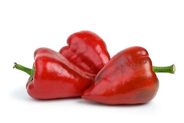 Image showing Three red sweet peppers