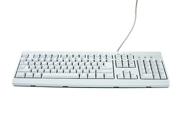 Image showing Classic white PC keyboard with english and russian symbol sets