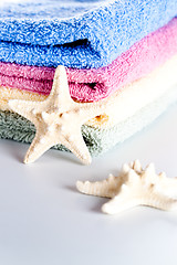 Image showing towels and sea stars 