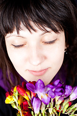 Image showing woman with purple and red flowers