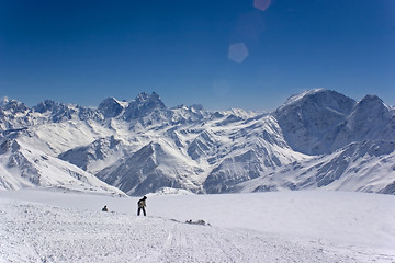 Image showing snowboarder in the mountains