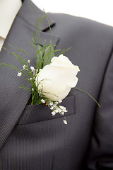 Image showing rose in his lapel of his jacket the groom