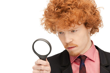 Image showing man with magnifying glass