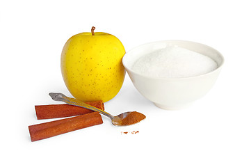 Image showing Yellow apple with cinnamon and sugar