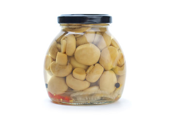 Image showing Glass jar with marinated champignons