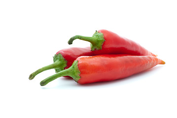 Image showing Three red hot peppers