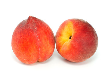 Image showing Pair of red peaches