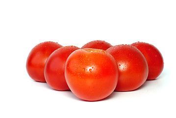 Image showing Six juicy tomatoes with drops of water
