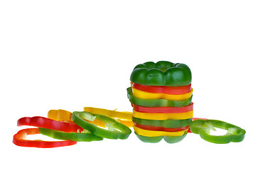 Image showing Red, yellow and green bell pepper slices