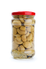 Image showing Glass jar with marinated champignons