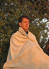 Image showing Meditating at Sunset