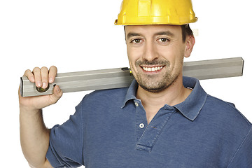 Image showing confident handyman with spirit level