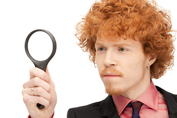 Image showing man with magnifying glass