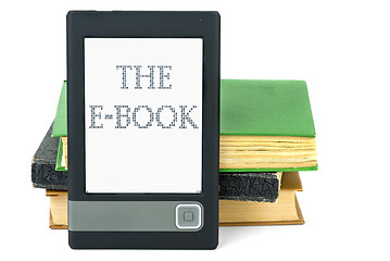 Image showing Modern ebook reader and old paper books