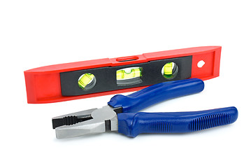 Image showing Bubble level tool and pliers