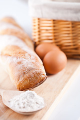 Image showing bread, flour, eggs and kitchen utensil