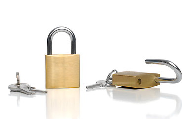 Image showing Two security gold locks and keys