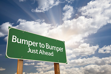 Image showing Bumper to Bumper Green Road Sign and Clouds