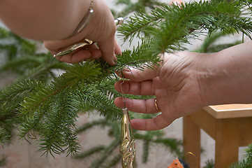 Image showing Decorating of Christmas tree