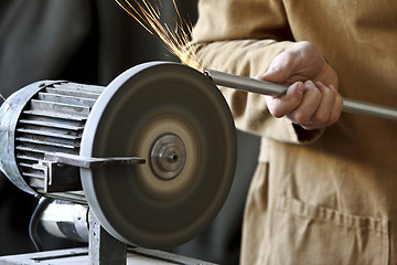 Image showing manual worker sharp tool