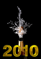 Image showing champagne bottle with shotting cork