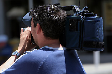 Image showing cameraman