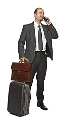 Image showing business man travel and use mobile