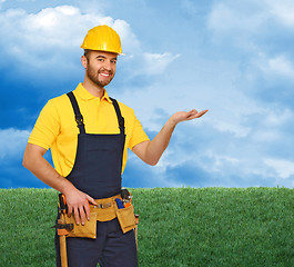 Image showing manual worker and natural background