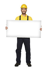 Image showing handyman hold white board