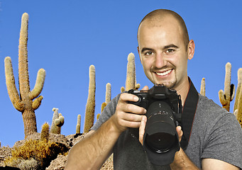 Image showing photographer and cactus background