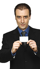 Image showing confident businessman and personal card