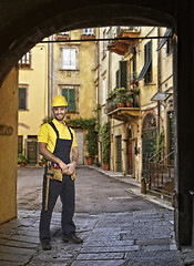 Image showing Lucca town detail and yougn handyman