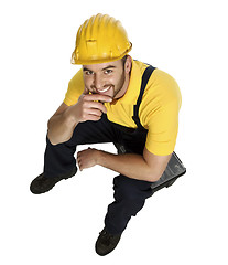Image showing smiling manual worker rest on toolbox