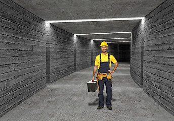 Image showing construction worker in concrete tunnel background