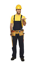 Image showing happy handyman standing on white background