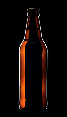 Image showing Bottle of beer, isolated on a black background