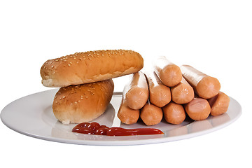 Image showing Sausages with bread and ketchup