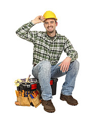 Image showing happy worker on toolbox