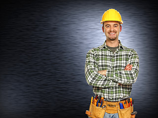 Image showing positive handyman smiling