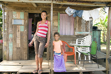 Image showing Nicaragua mother daughter clapboard  house Corn Island