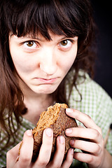 Image showing beggar with a piece of bread 