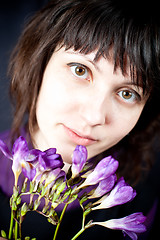 Image showing woman with purple flowers