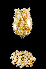 Image showing Wine glass with popcorn 