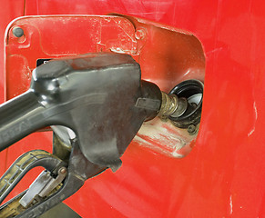 Image showing Filling a car