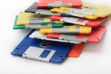 Image showing Many colored compute diskette isolated on white