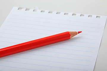 Image showing The note and red pencil