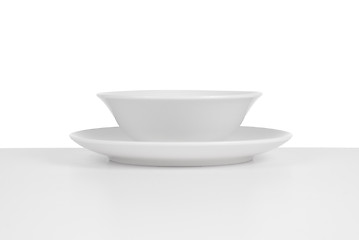 Image showing White ceramic bowl and dish