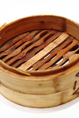 Image showing Chinese steamed dimsum in bamboo containers traditional cuisine 