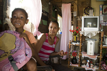 Image showing Nicaragua mother child daughter interior clapboard house Corn Is